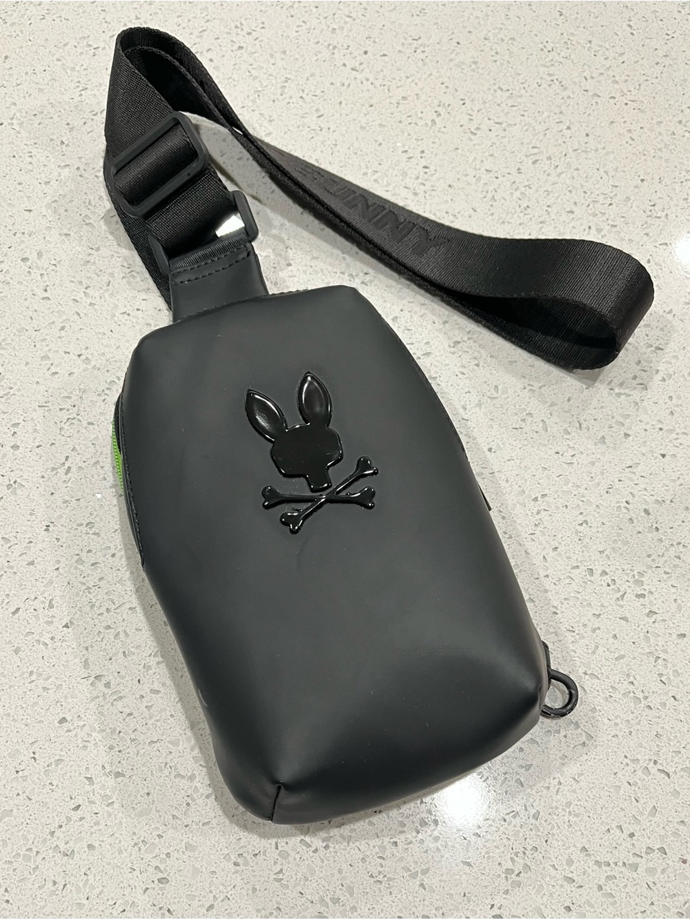 Psycho Bunny Matte Black Sling Bag with Glossy Logo